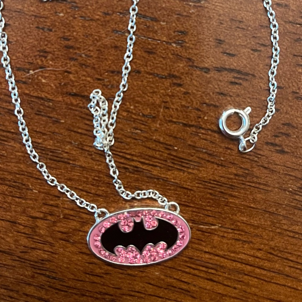 Pink jeweled Batman necklace with silver hardware